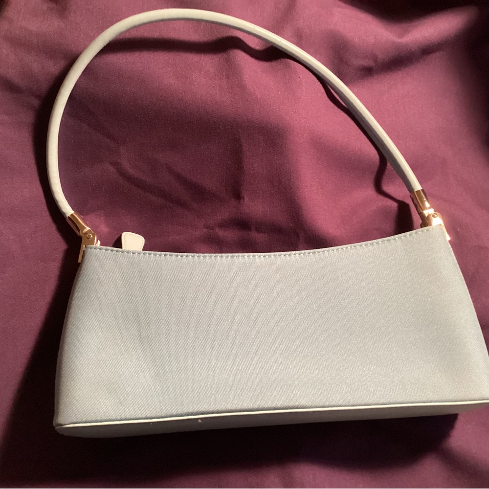Small light blue ladies purse